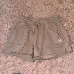 Selling 2 pairs of reebok shorts! Very cozy and cute. Just too small for me!